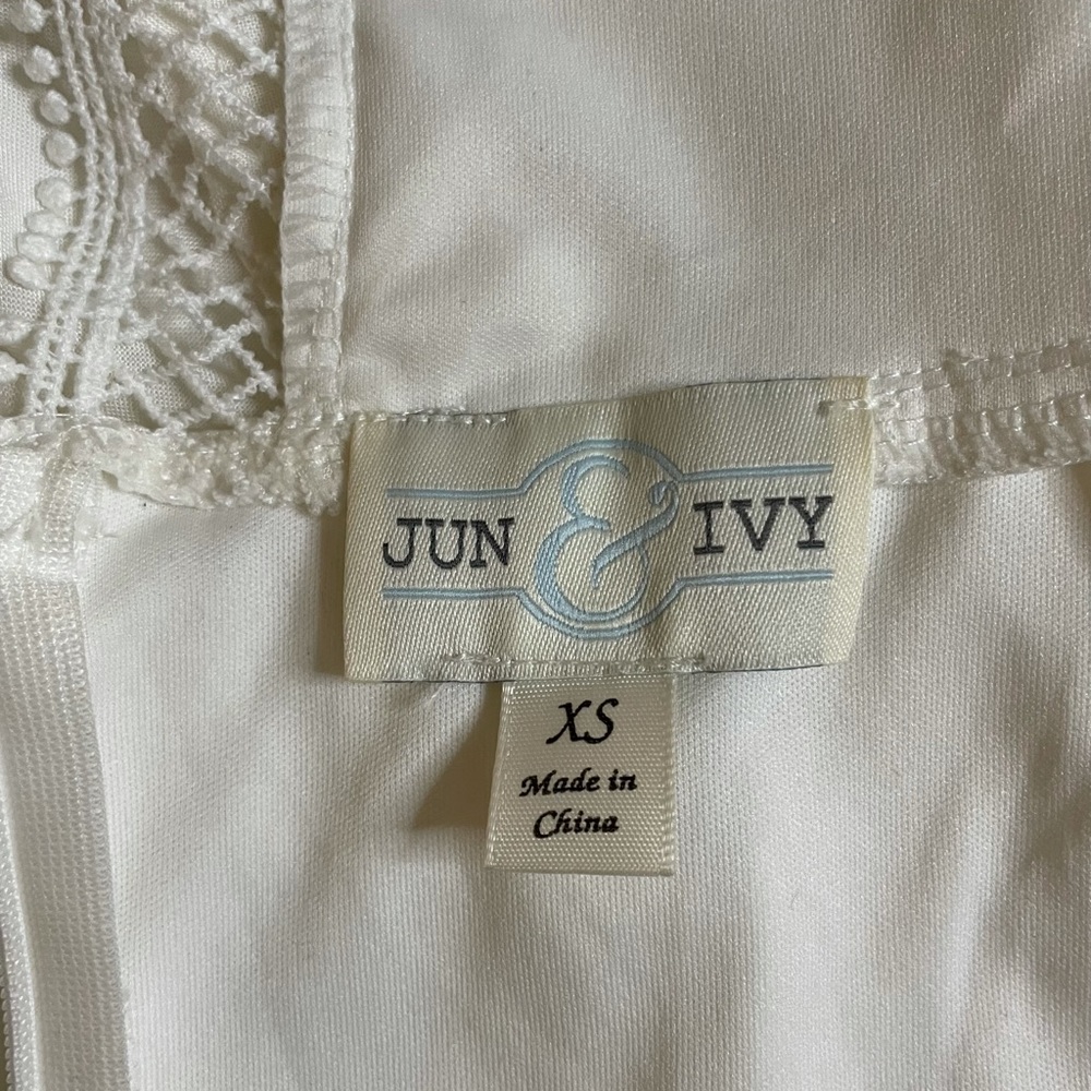 Blouse from francescas  size xs open back that you can tie, size zipper